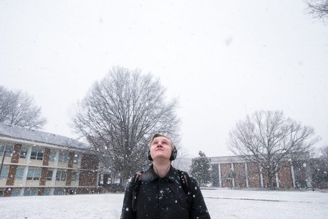 "First snow fall of the spring semester falls upon the Fairfax Campus. Photo by Craig Bisacre/Creative Services/George Mason University